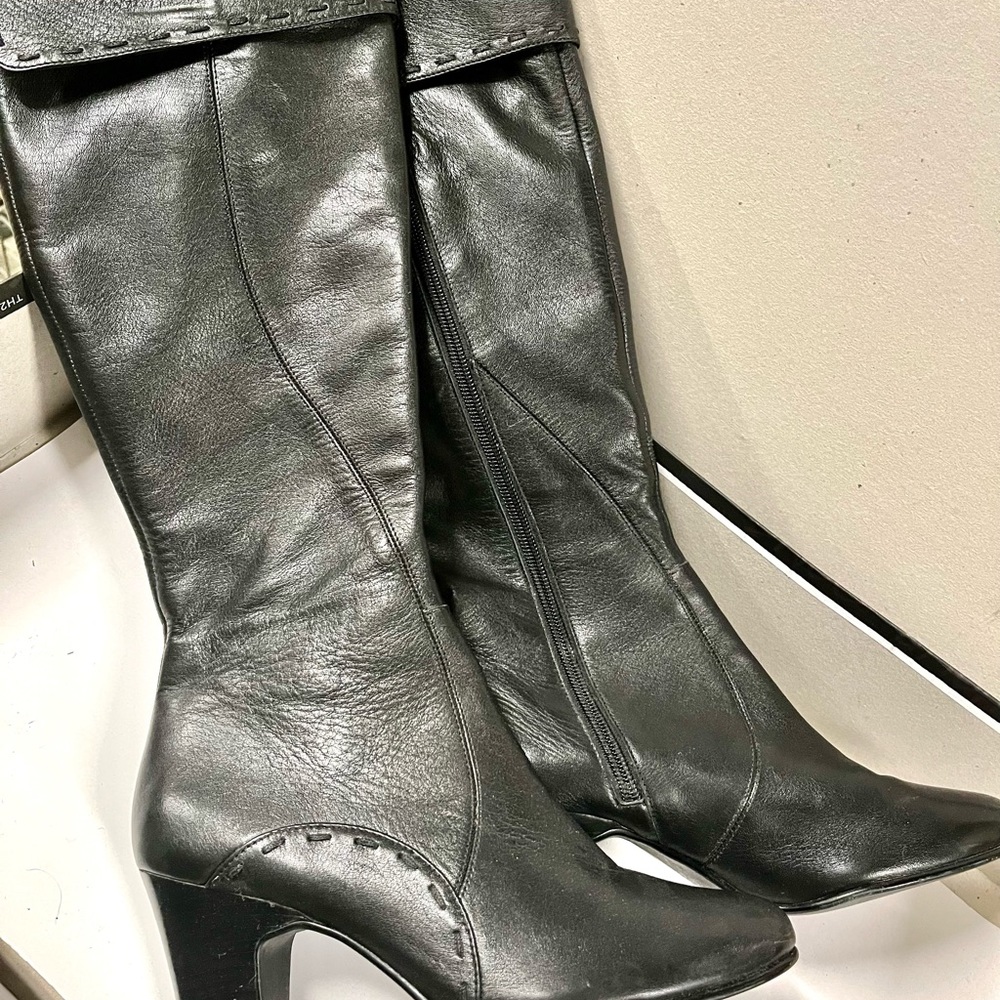 NWOT Black leather high boots, size 6.5, new. Middle height hills. Under knee